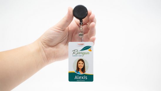 ID Card with hole punch and retractable lanyard